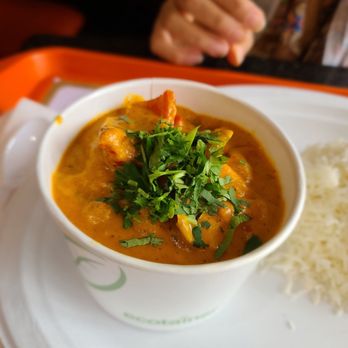 Desi Tadka Indian Grill signature dishes Chicken Tikka MasalaLamb Rogan JoshGarlic Naan